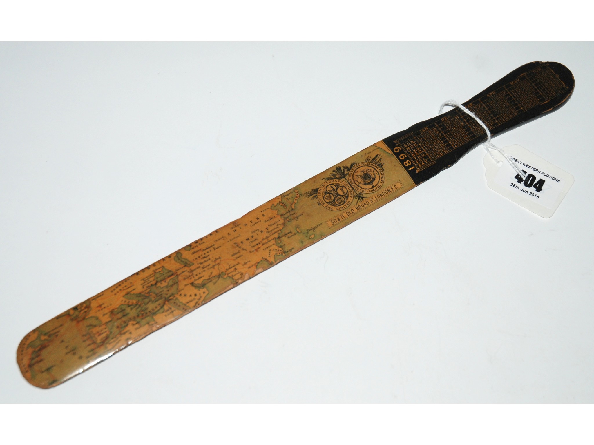 Appraisal: A Victorian Eastern Telegraph Company paper knife with printed world