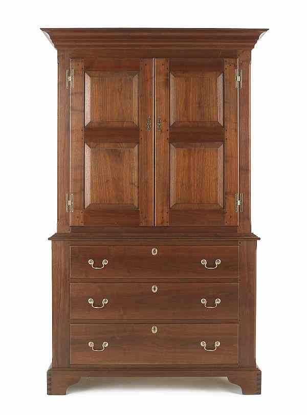 Appraisal: Chippendale style walnut press cupboard by Russ Kramer h w