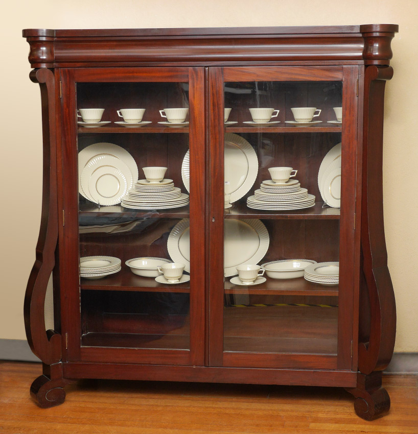 Appraisal: EMPIRE MAHOGANY DOUBLE GLASS DOOR BOOKCASE Mahogany case canted corners