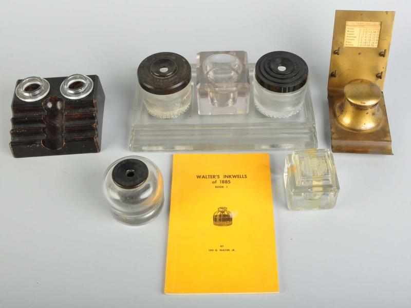 Appraisal: Lot of Inkwells Book on Inkwells Description Mostly glass Condition