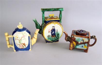 Appraisal: Three majolica 'Japanese' style teapots early th century Each with