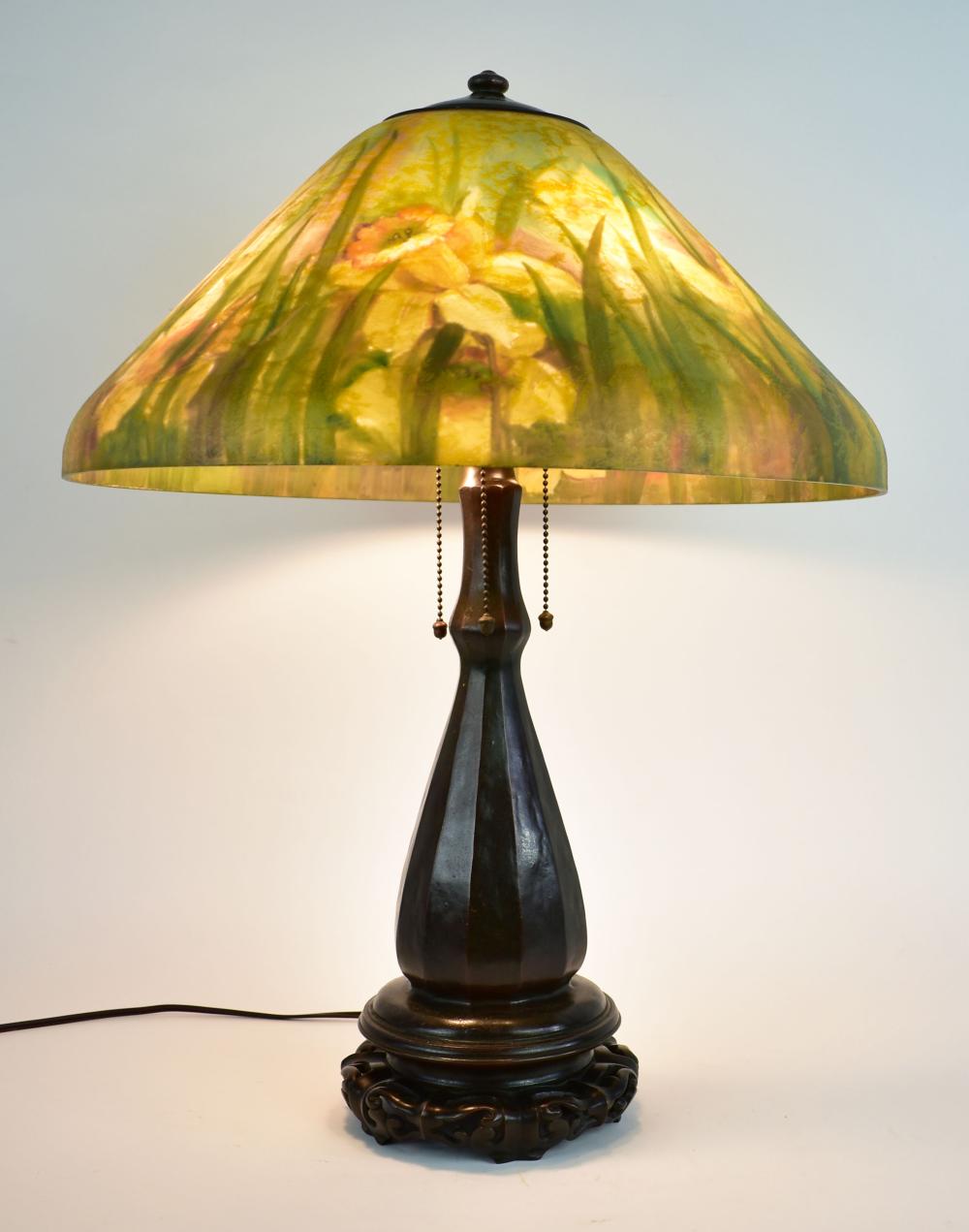 Appraisal: HANDEL REVERSE PAINTED GLASS DAFFODIL LAMP Circa The bronze rim