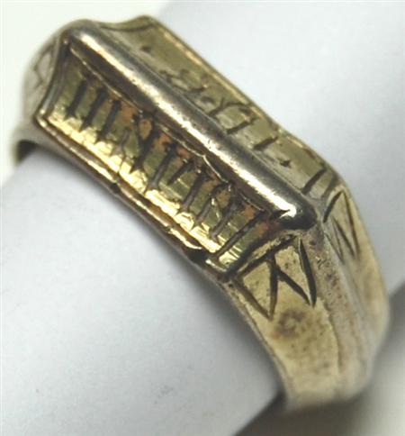 Appraisal: An antique gentleman's silver gilt ring the bevelled front with