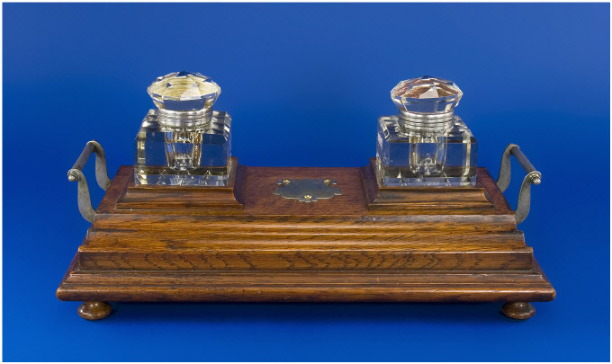 Appraisal: Edwardian Two Handled Oak Ink Stand With large glass inkwells