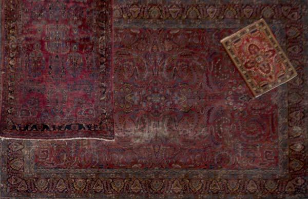 Appraisal: THREE CARPETS Machine made carpet x together with a small