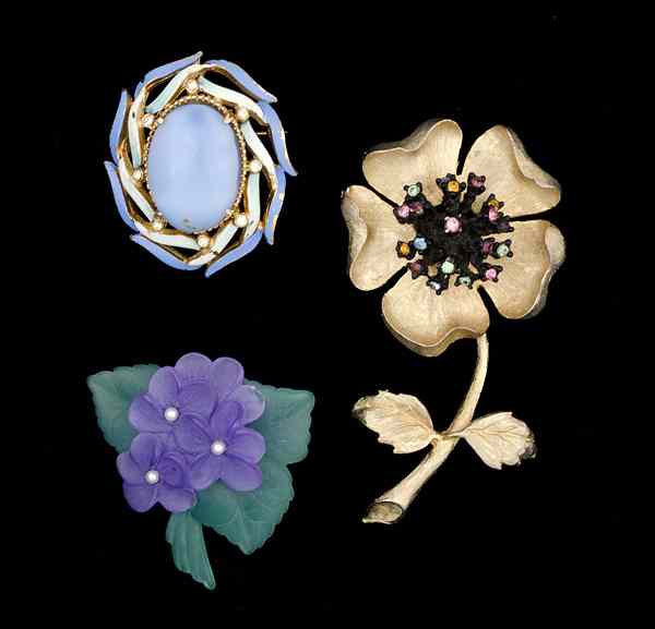 Appraisal: Ledo Unsigned Costume Brooch Collection A Ledo brooch and two