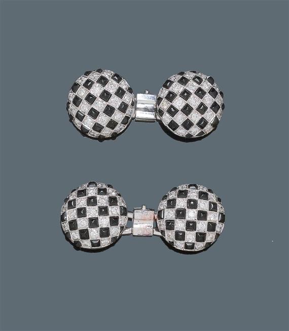 Appraisal: DIAMOND AND ONYX CUFF LINKS White gold Elegant round twin