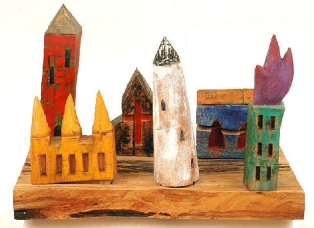 Appraisal: Ross Laurie born Townscape painted carved wooden sculpture on base