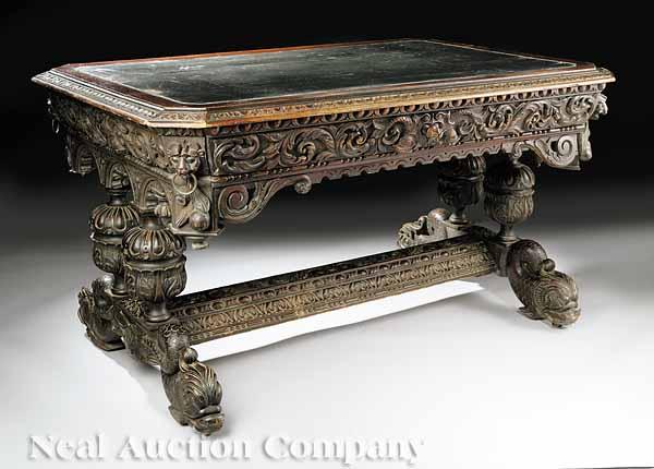 Appraisal: An American Renaissance Highly Carved Oak Library Table late th