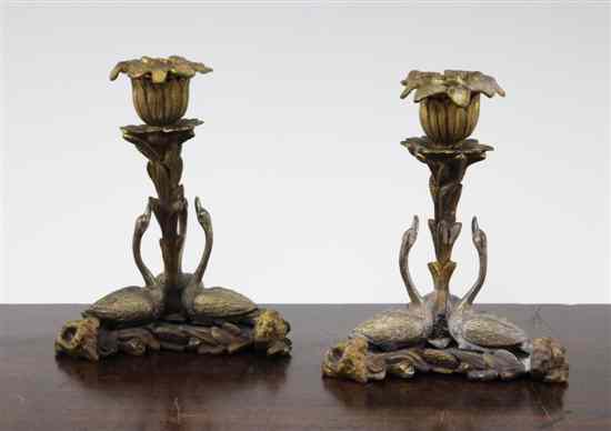 Appraisal: A pair of George IV ormolu and bronze candlesticks after