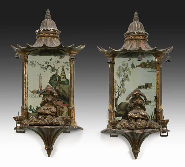 Appraisal: A pair of Chinoiserie pagoda form two light mirrored sconces