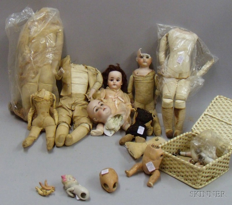 Appraisal: Bisque Doll and Assorted Parts late th early th century