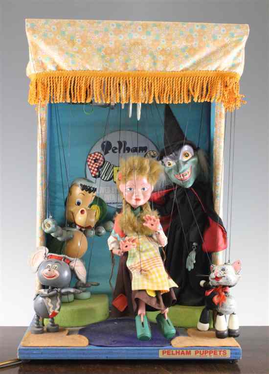 Appraisal: A Pelham Puppet's mechanical shop display booth with five puppets