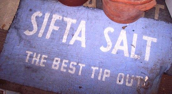 Appraisal: Two door mats advertising Sifta Salt and two terracotta storage