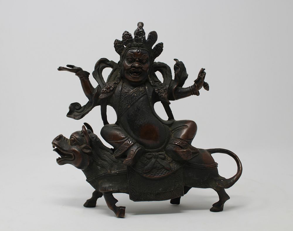 Appraisal: Tibetan Bronze Figure on Ox Tibetan Bronze Figure on Ox