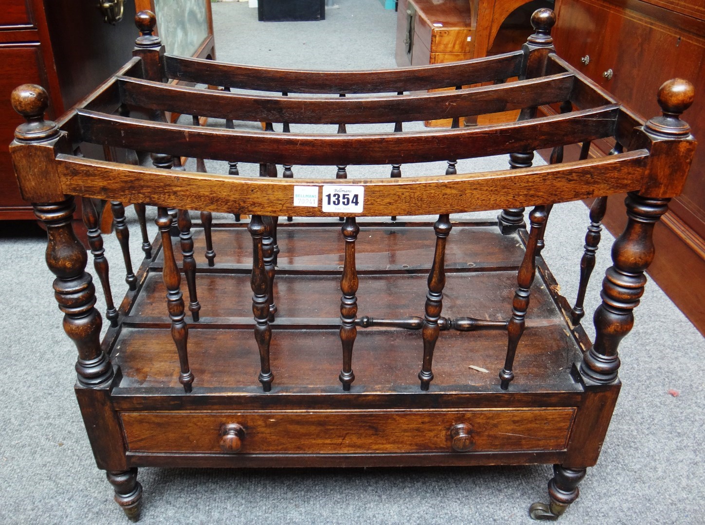 Appraisal: A th century mahogany three division Canterbury with single drawer