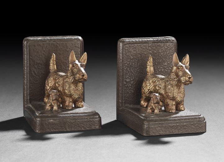 Appraisal: Pair of Patinated and Parcel-Gilt Cast-Bronze Scottie Bookends second quarter