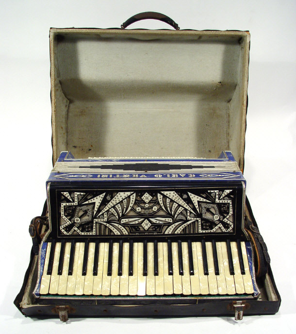 Appraisal: Carlo Veotini accordion with ornate pierced marbleised casing and keys