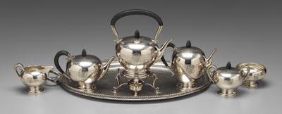 Appraisal: Six-piece sterling tea service wooden scroll handles and pineapple finials