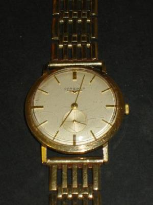 Appraisal: A GENT'S CT GOLD LONGINES WATCH the winding movement having