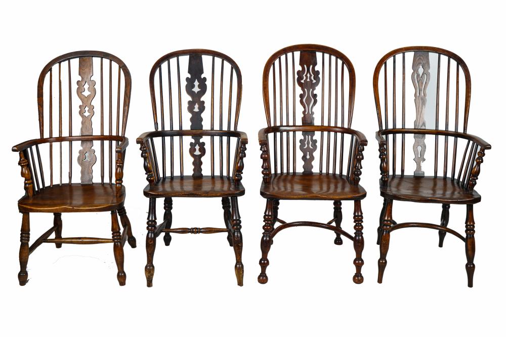 Appraisal: FOUR ENGLISH HIGH SPINDLE BACK WINDSOR ARMCHAIRSCondition one chair repaired