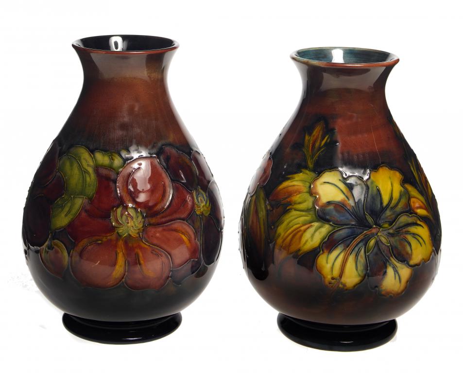 Appraisal: A MOORCROFT FLAMB CLEMATIS VASE AND A MOORCROFT FLAMBE HIBISCUS