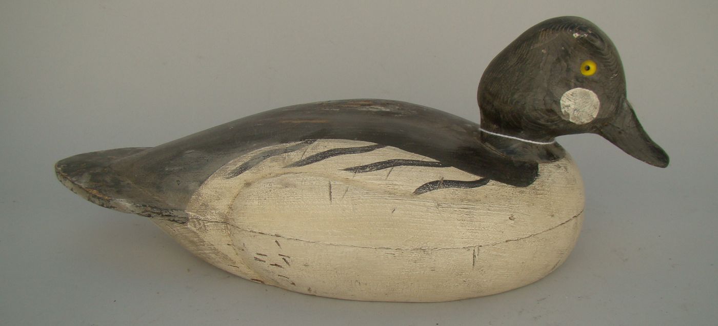 Appraisal: HOLLOW-CARVED GOLDENEYE DRAKE DECOY From Canada Original paint