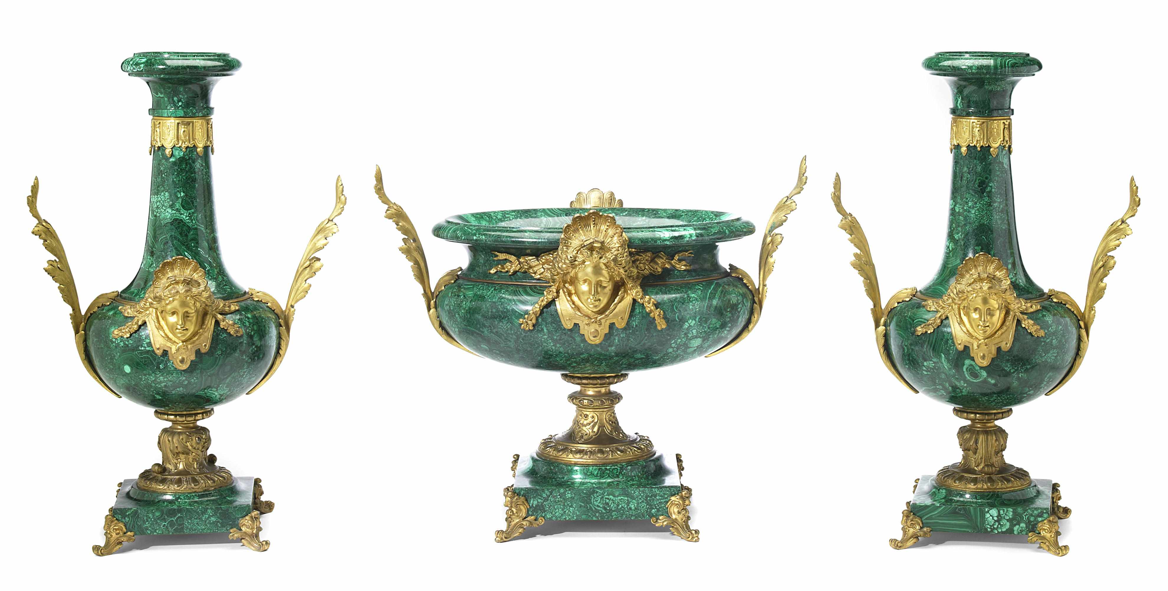 Appraisal: A French gilt bronze mounted later malachite veneered table garniture