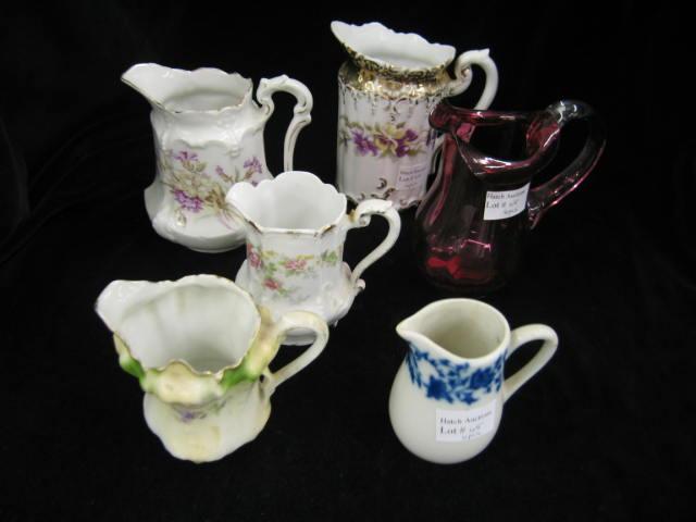 Appraisal: Collection of Creamers cranberry glass various porcelain