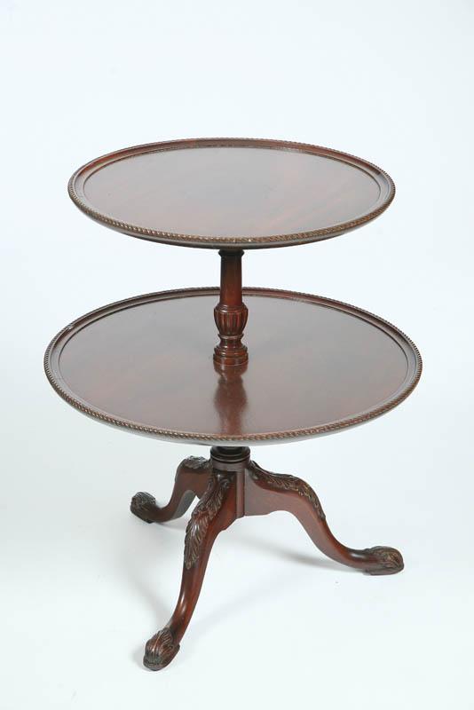 Appraisal: TIERED STAND Mahogany having two tiers with rope twist edges