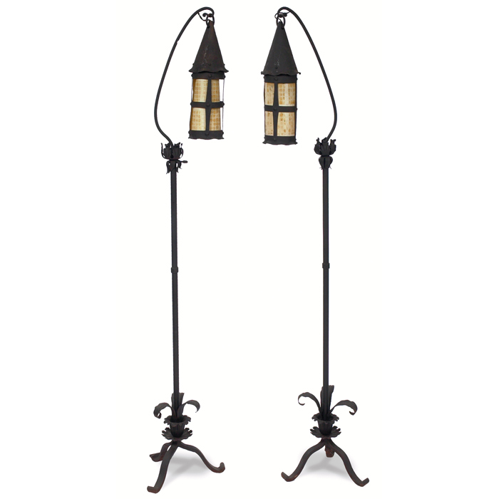 Appraisal: Arts and Crafts floor lamps pair in iron hanging lantern