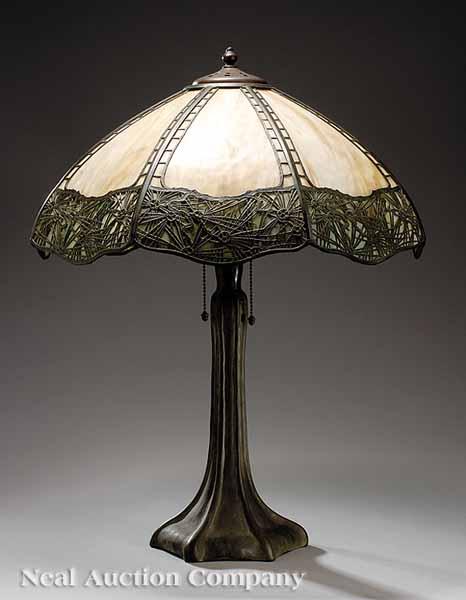 Appraisal: A Handel Patinated Bronze and Slag Glass Table Lamp early