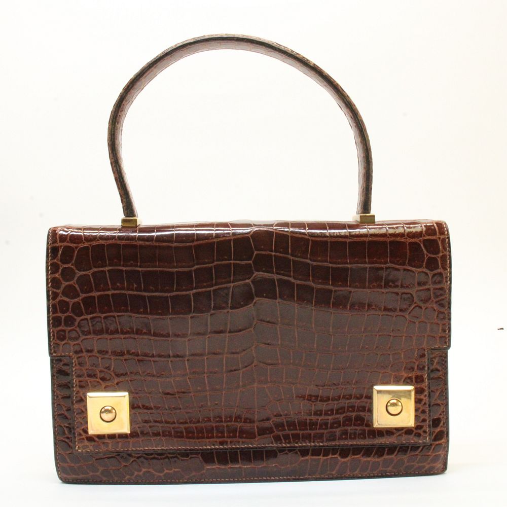 Appraisal: Hermes Porosus Crocodile Piano Bag A vintage Hermes Miel Shiny