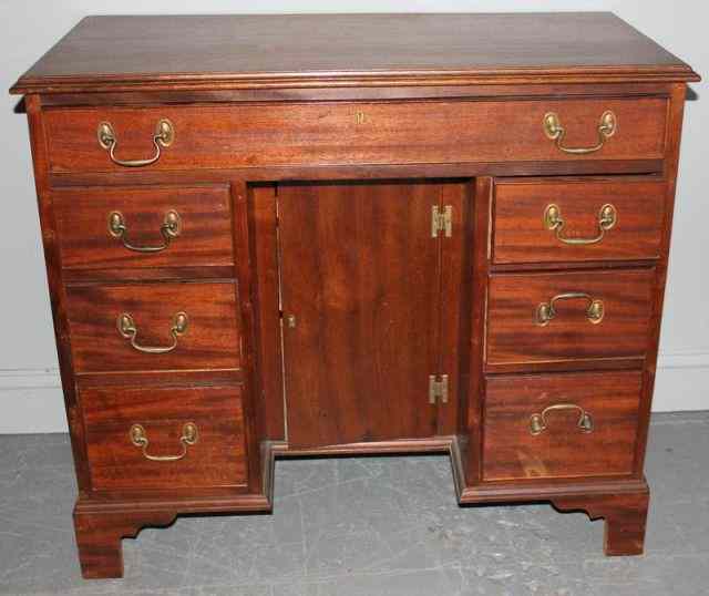 Appraisal: Bench-made Mahogany Kneehole Desk With interior recessed cabinet Possibly an