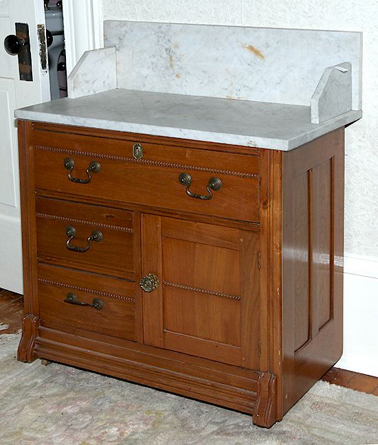 Appraisal: Oak Marble Top Wash Stand A ca oak wash stand