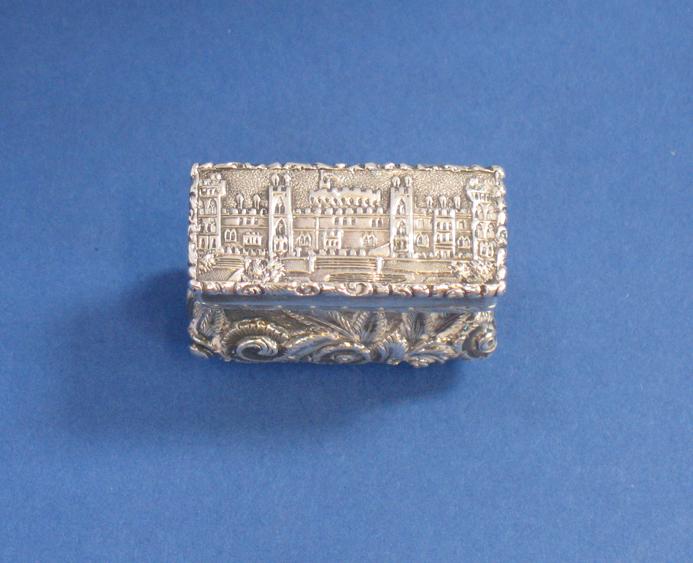 Appraisal: A VICTORIAN CASTLE TOP VINAIGRETTE of rectangular waisted upright form