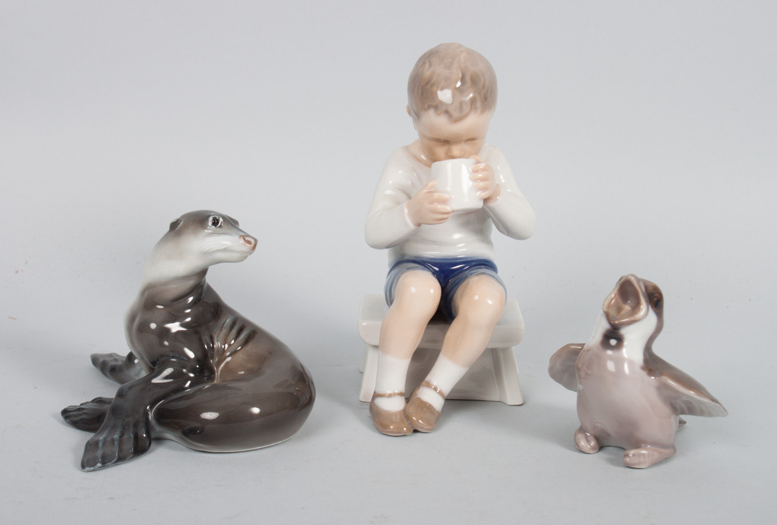 Appraisal: Three Continental porcelain figures including Rosenthal seal Bing Grondahl seated