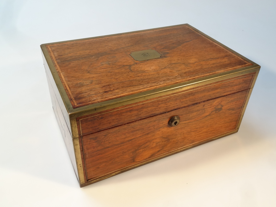 Appraisal: A thC rosewood and gilt metal campaign box the rectangular