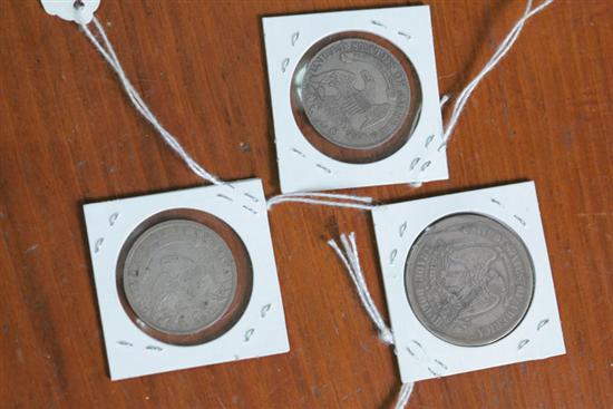 Appraisal: THREE EARLY AMERICAN COINS silver Trade Dollar and Turban Head