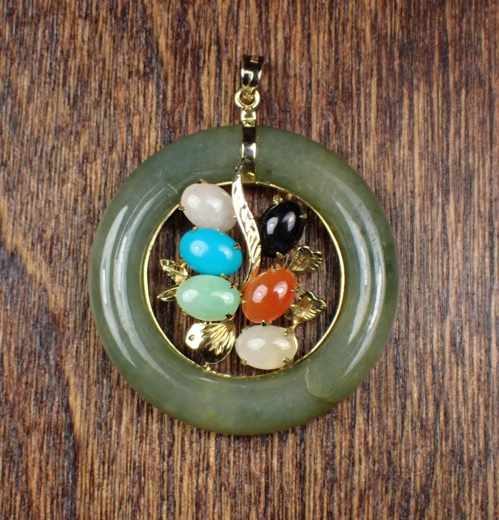 Appraisal: MULTI COLOR JADE AND FOURTEEN KARAT GOLD PENDANT with a