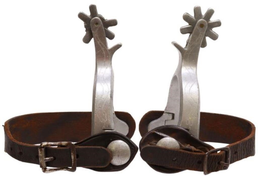 Appraisal: pair Unusual airplane metal aluminum cowboy spurs outside heelband engraved