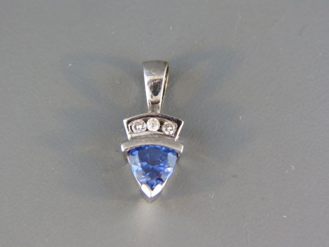 Appraisal: Tanzanite Diamond Pendant rich triangular gem weighing carat with diamonds