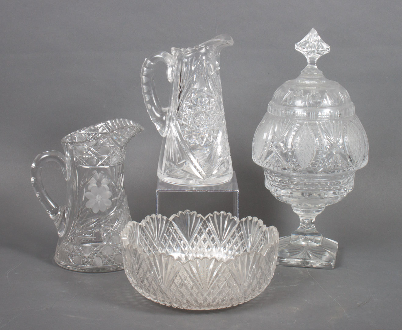 Appraisal: Four pieces of colorless cut glass Anglo-Irish covered sweet meat