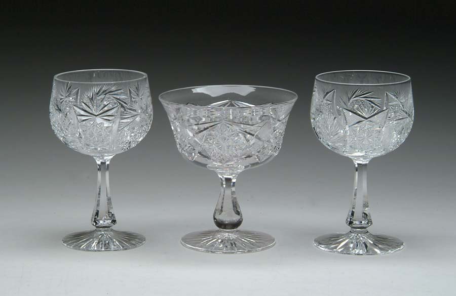 Appraisal: THREE CUT GLASS ITEMS Lot consists of two water goblets