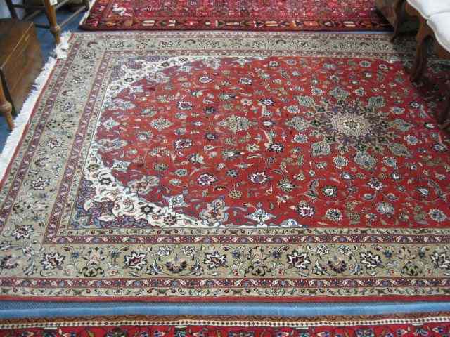 Appraisal: Tabriz Persian Handmade Rug elaborate flowering vine red field '