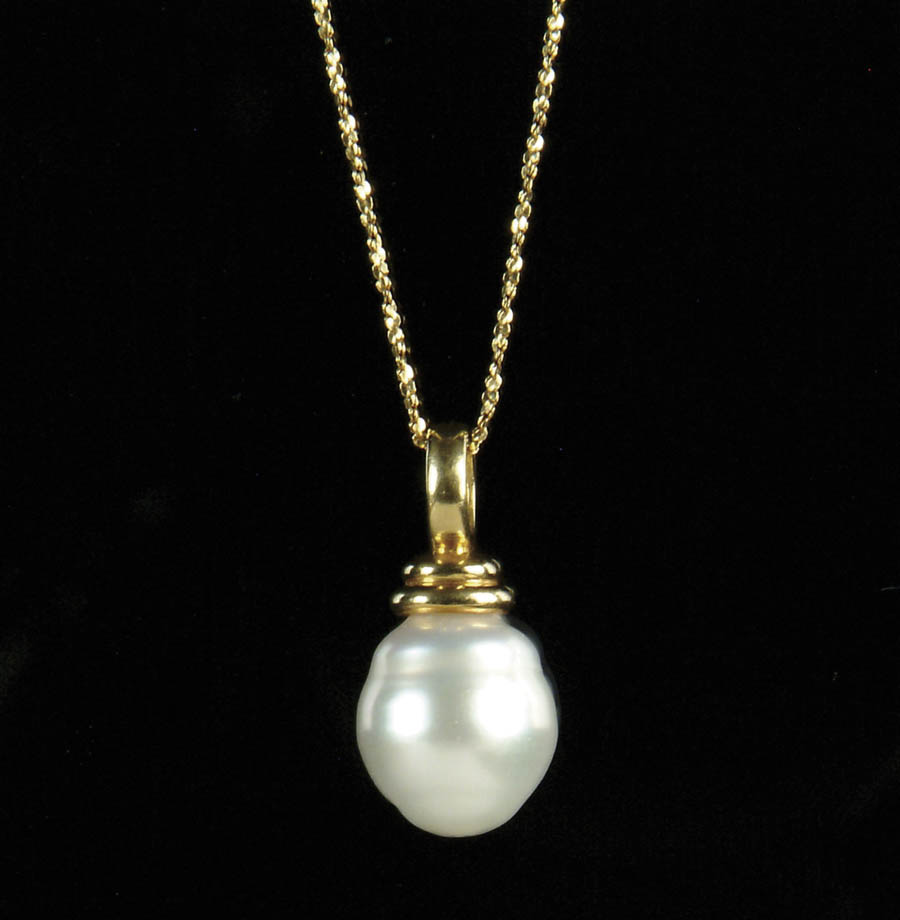 Appraisal: BAROQUE SOUTH SEA CULTURED PEARL PENDANT WITH K GOLD CHAIN