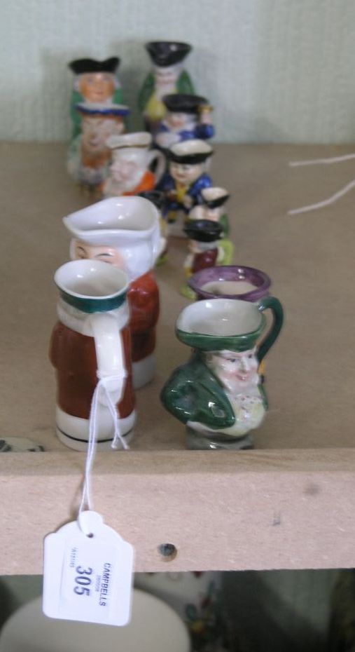 Appraisal: Sixteen various ceramic toby jugs small size tallest in