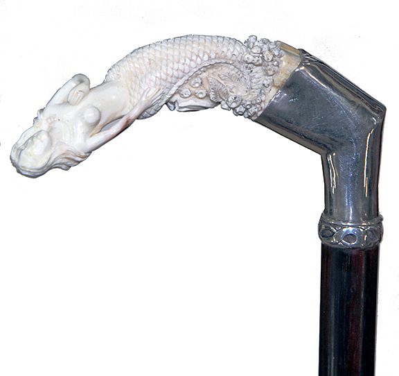 Appraisal: Topless Mermaid Pig Ivory Cane th Century- A large warthog