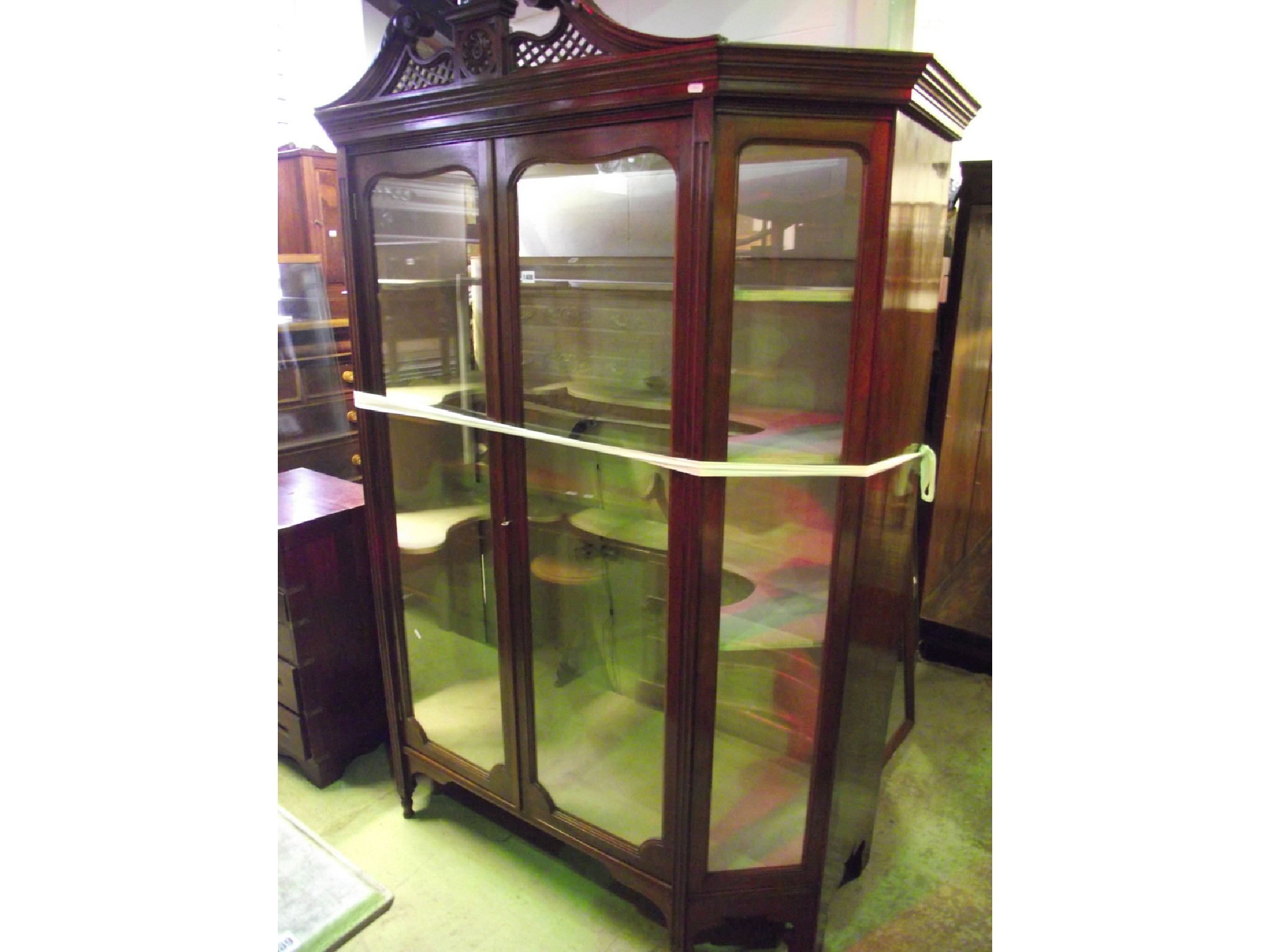 Appraisal: A substantial late Victorian Edwardian breakfront side cabinet with broken