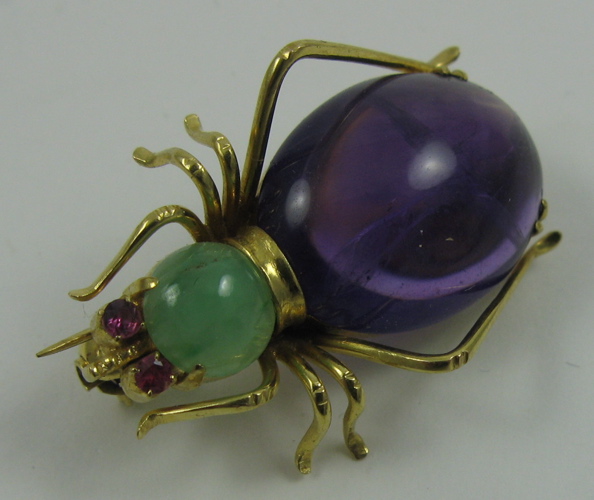 Appraisal: AMETHYST AND FOURTEEN KARAT GOLD BROOCH The insect brooch is